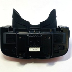Nintendo Virtual Boy console, 3 games, and AC adapter/tap included.