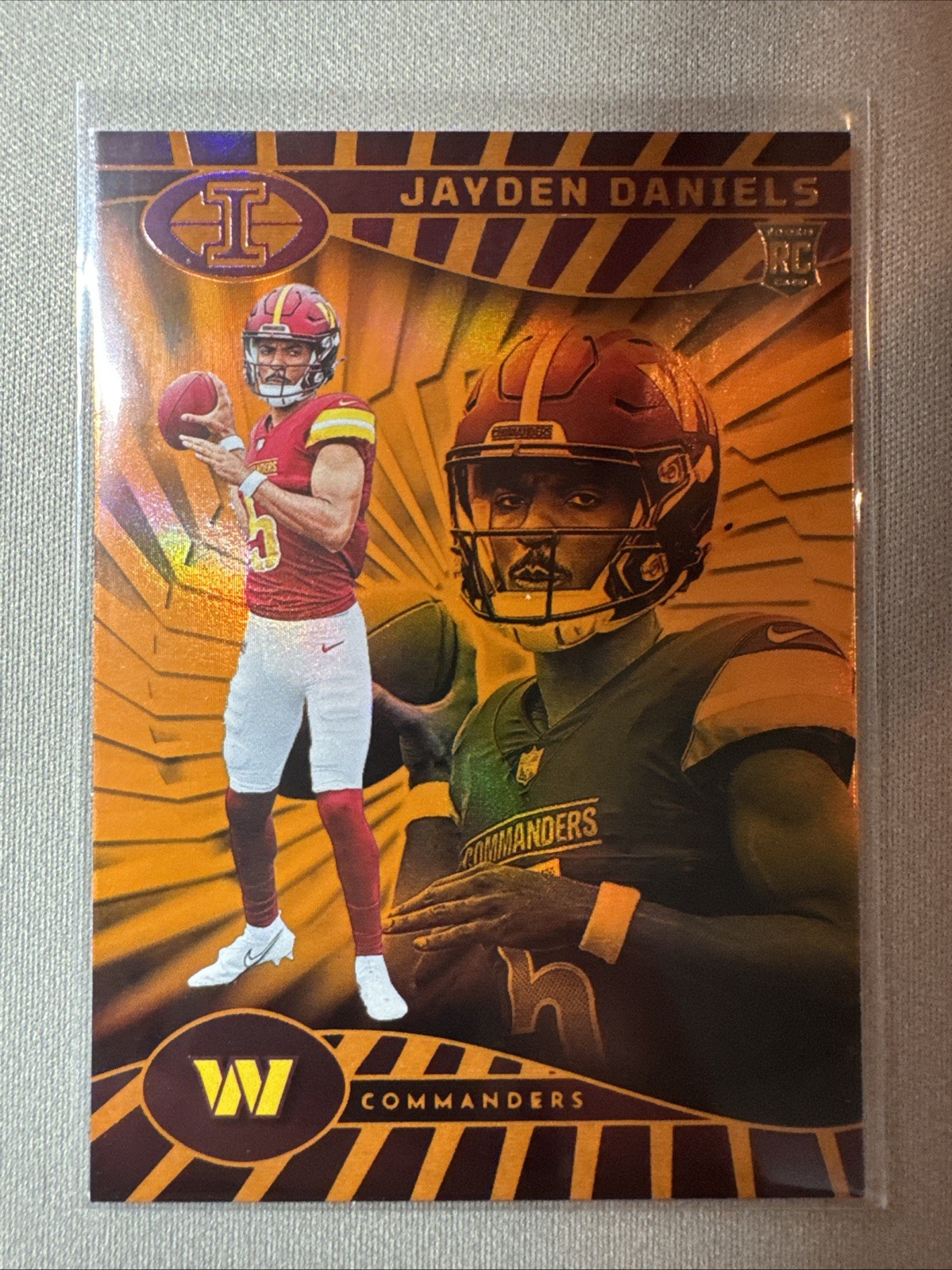 2024 Panini Illusions Jayden Daniels #93 Trophy Collection Orange (RC)