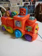 VTech Roll & Surprise Animal Train Music & Lights Pop-Up Activity Preschool Toy