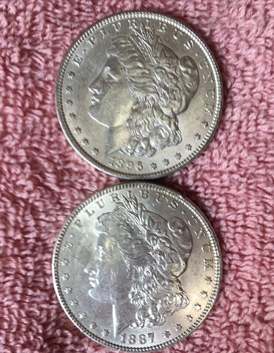 MORGAN SILVER DOLLAR COINS.  LOT OF 2 UNCIRCULATED  PRE. 1921 LOT # 28