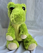 Aurora 12 in. Dreamy Eyes Green T-Rex Sitting Dinosaur Stuffed Animal Plush Toy