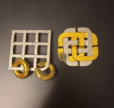 2 X Metal Brain Teasers Duet And Lucky Clover