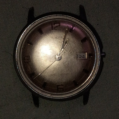 Timex Vintage Manual Wind Date Silver Sunburst Dial 34mm Black Case Watch
