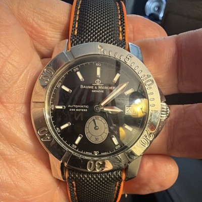 baume & mercier geneve automatic diver watch black dial orange rubber strap