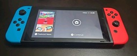 Nintendo Switch with Neon Blue and Neon Red Joy-Con (HAC-001-01)