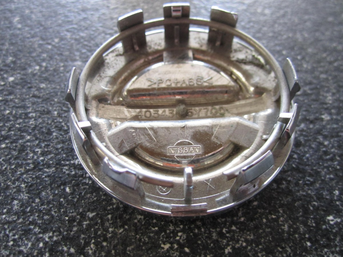 Nissan Chrome Grooved OEM Center Caps 2-1/8 Nissan Chrome Grooved OEM Center Caps 2-1/8