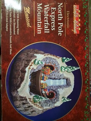 Vintage North Pole Express Christmas table top mountain waterfall train.