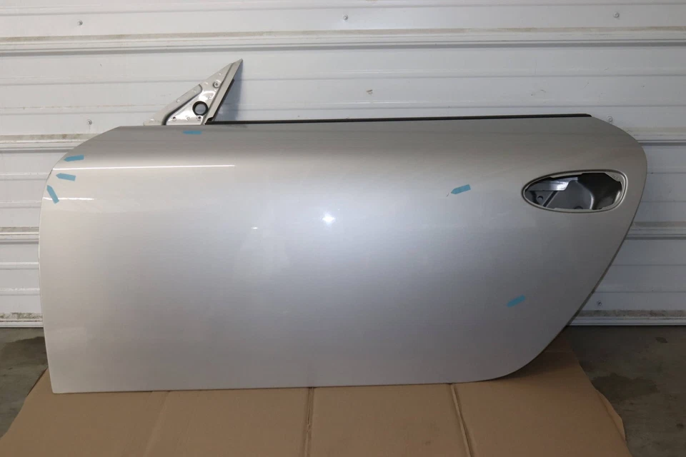 Porsche Boxster 2009-2012 - Carcasa puerta delantera izquierda / piel 99753101104 Foto 2 de 4