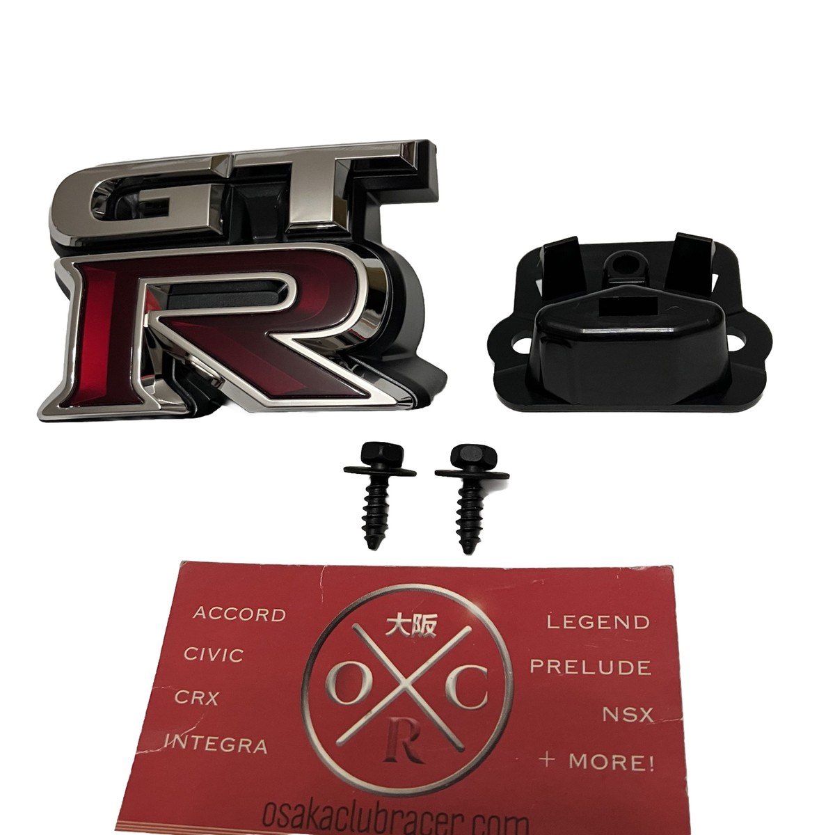 Genuine OEM 2009-2024 Nissan GT-R Front Grille Emblem & Bracket