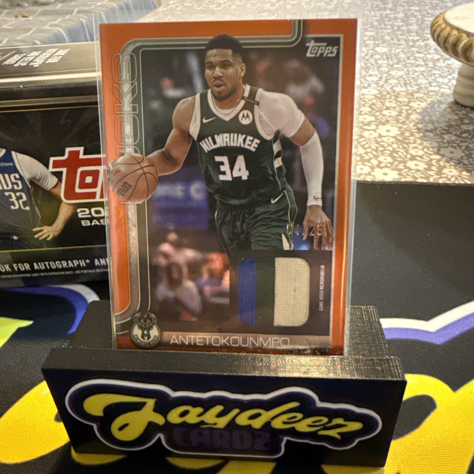 2025-26 Topps Flagship Real One Orange Giannis Antetokounmpo GU Relic 4/25 HD