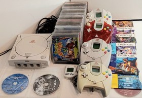 SEGA Dreamcast Console W/ 4 Controllers, 5 Memory, and 30+ Games And Demo Disc