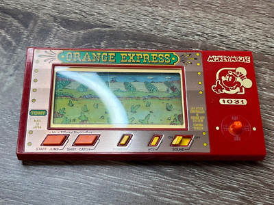 Mickey Mouse Orange Express Tomy (unknown) ▷ Retro Handheld