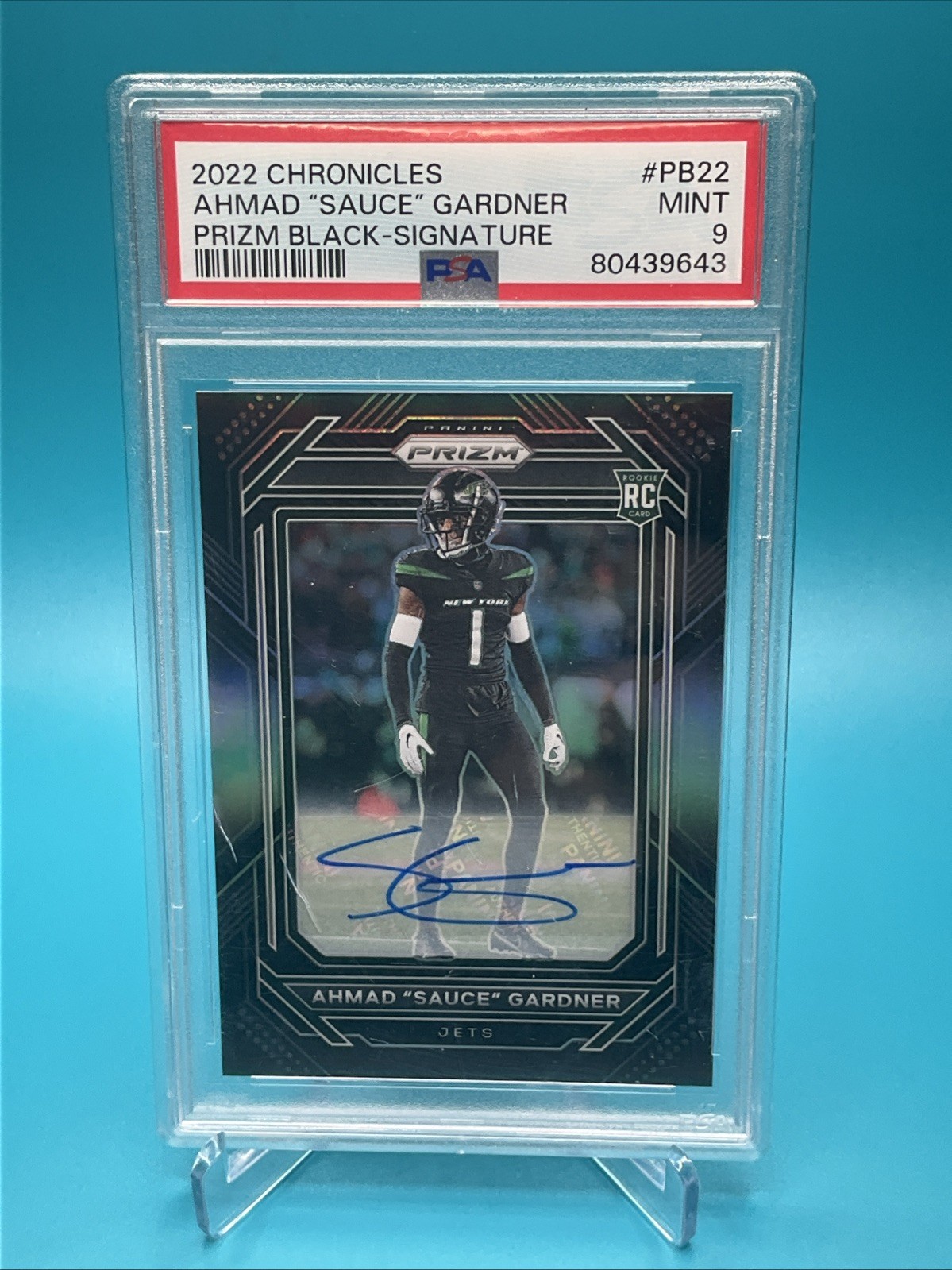 2022 Chronicles Ahmad "Sauce" Gardner Prizm Black Rookie Auto PSA 9 (cracked)