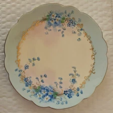 7-5" Blue Floral Design, unreadable potters mark, no crazing chips or cracks