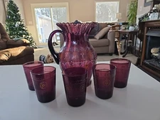 Victorian amethyst glass pitcher and tumblers set