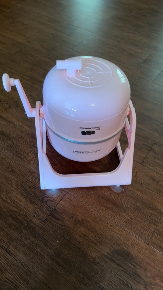 Mini lavadora no eléctrica The Laundry Alternative Wonderwash rosa Foto 2 de 2