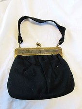 Vintage Baguette Handbag Black Sewn Strap Metal Trim Well Padded and Lined