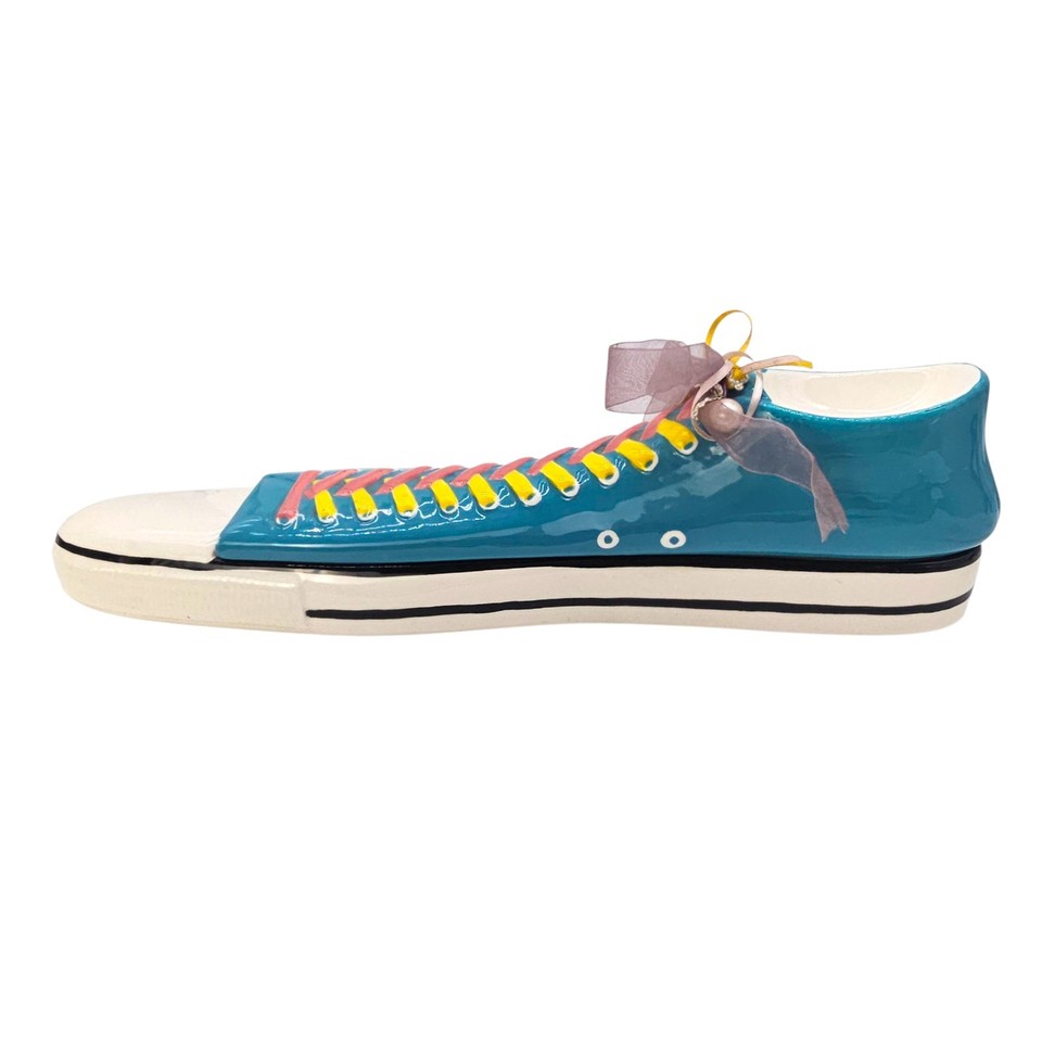 A 19-inch sneaker-shaped trinket/jewelry box styled like a Converse high-top — a bold, sculptural novelty piece that doubles as shelf decor.