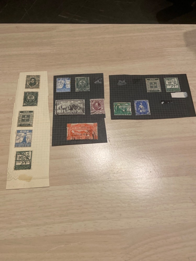 Ireland/Eire stamps hinged on old album pages. #bx11