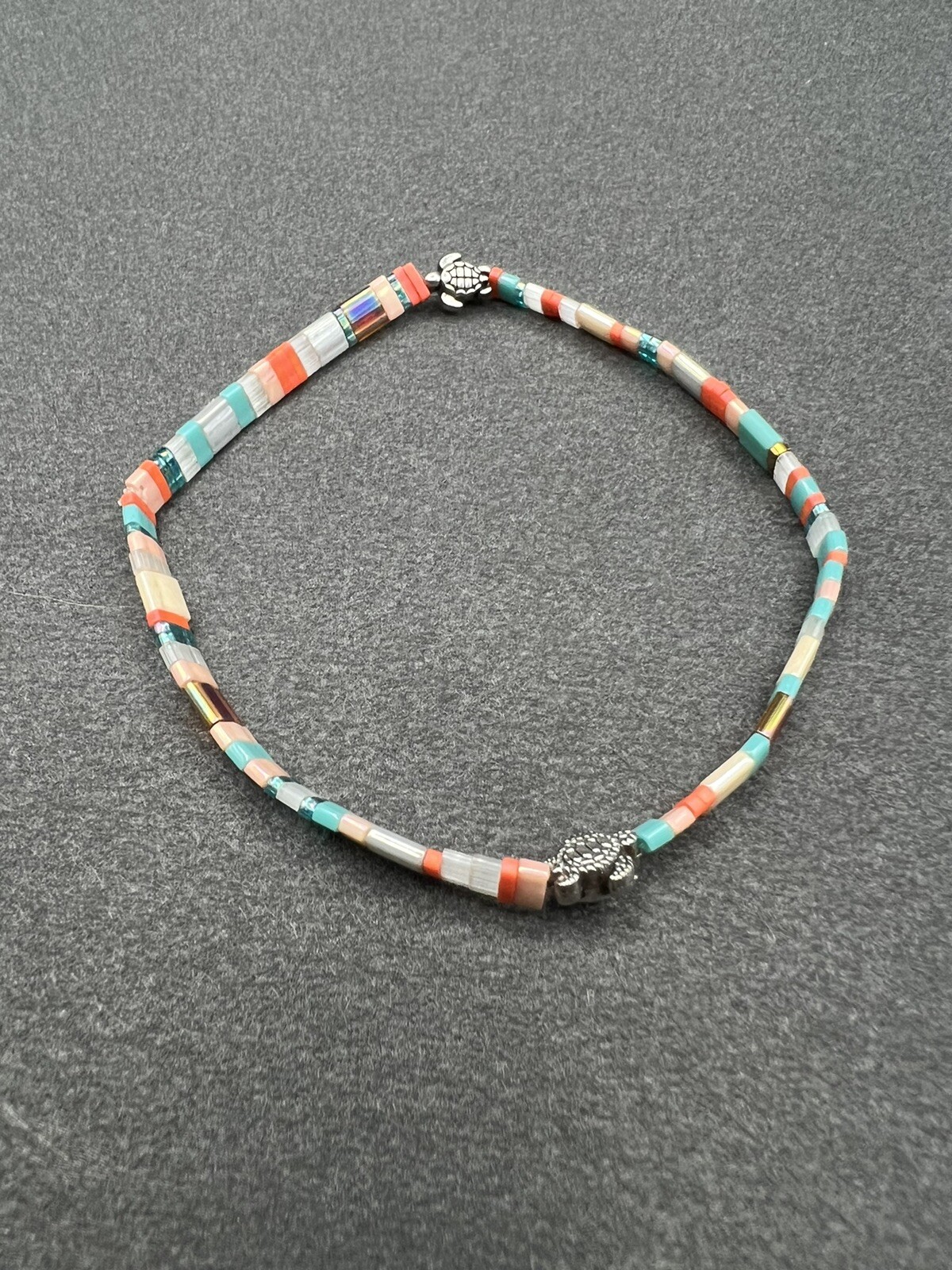 Anklet - elastic tila beaded anklet with sterling silver turtle accent beads-image