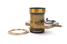 Brass lens with rotary diaphragm shutter. Serial Number: No. 222