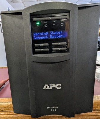 APC UPS: 670W  120V SMT1000 - USED