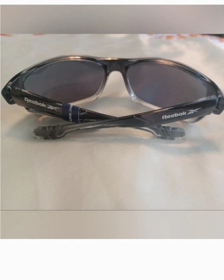 Gafas de sol envolventes REEBOK para hombre negras desvanecidas lentes azul cobalto RBOP 2116 XGRY Foto 2 de 3