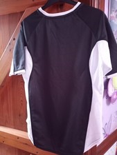 Boys Kipsta  football shirt size small BLACK & WHITE