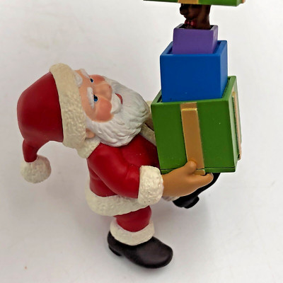 2001 Hallmark PEEK-A-BOO PRESENT Santa Claus w/ Stack of Gifts ORNAMENT