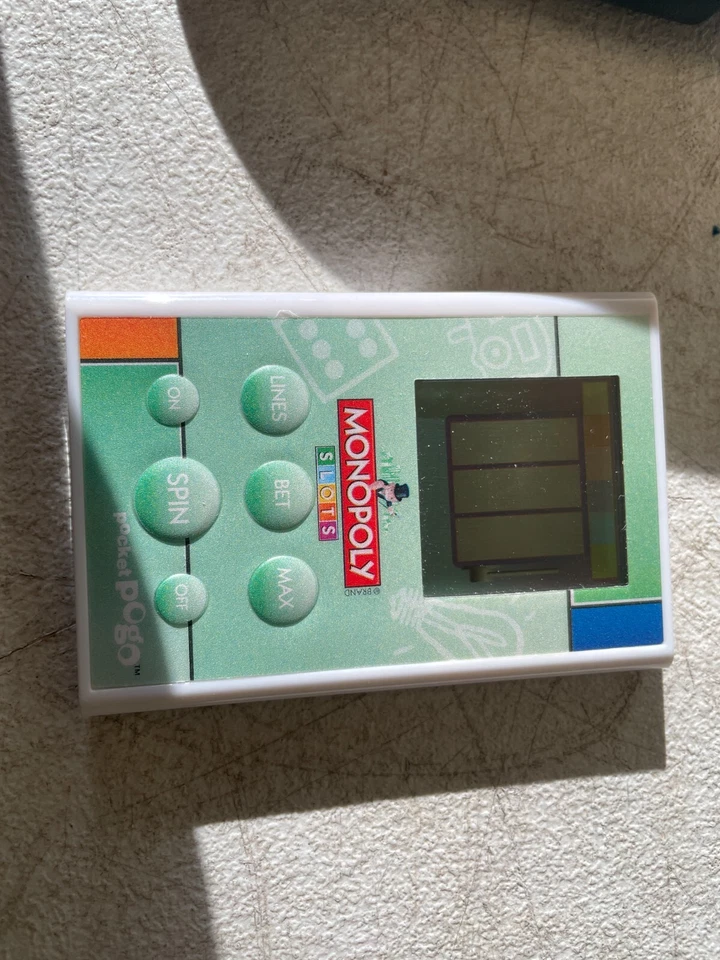 Lote de 3 juegos electrónicos portátiles vintage - solitario, monopolio de bolsillo y tragamonedas Foto 3 de 4