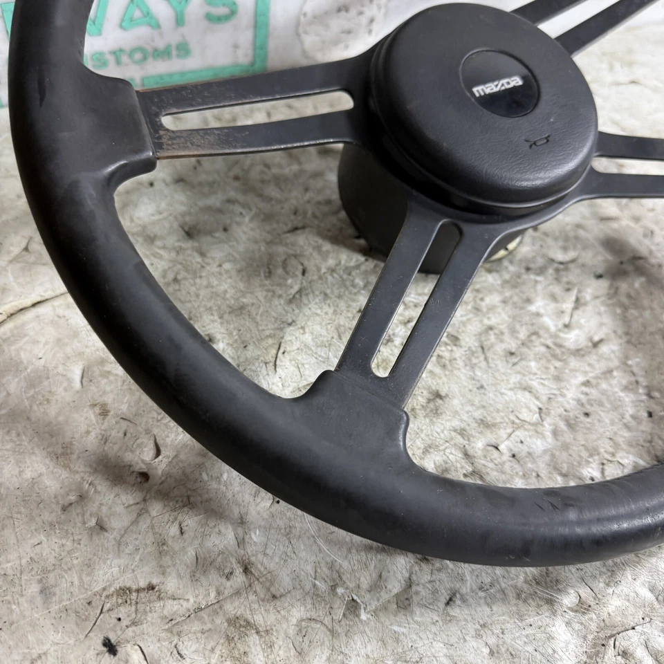 78-85 Mazda RX7 volante y botón de bocina FB SA Foto 3 de 4