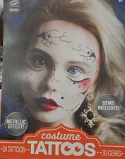 Metallic Glam Costume Face Tattoos With Gems. 2 sheets, 24 tattoos, 30 Gems