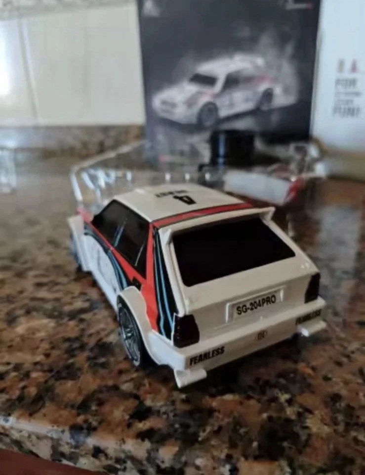 Auto telecomandata Lancia Delta integrale radiocomandata RC 1/24 fari led - Immagine 3 di 4