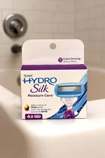 SCHICK HYDRO SILK MOISTURE CARE 5 BLADE CARTRIDGES 4 CT W/ HYDRA-BOOST SERUM NIB
