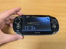 Sony PlayStation Vita Black Handheld Gaming System PCH-1003 With Charging Cable