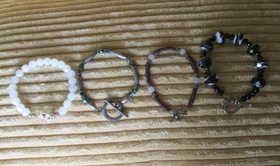 Lot of 4 toggle style black, white, silver, brown beaded bracelets