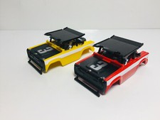 AFX AURORA-FORD BRONCO CUSTOM Body's RED YEL 3 "BLACK OUT" BRAND NEW