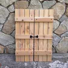 Modern farmhouse board and batten cedar shutters sold by the pair with hardware
