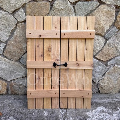 Modern farmhouse board and batten cedar shutters sold by the pair with hardware