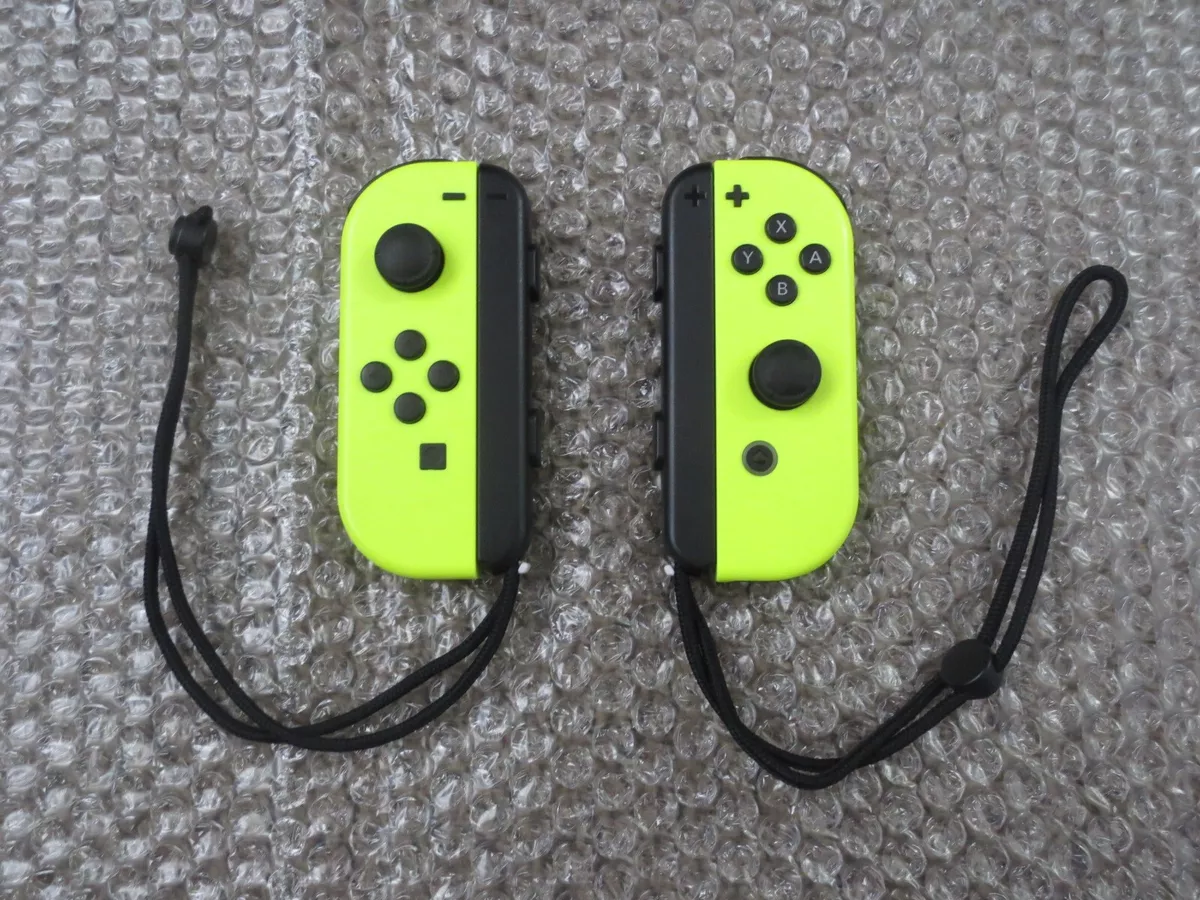  Nintendo Blue/ Neon Yellow Joy-Con (L-R) - Switch : Video Games