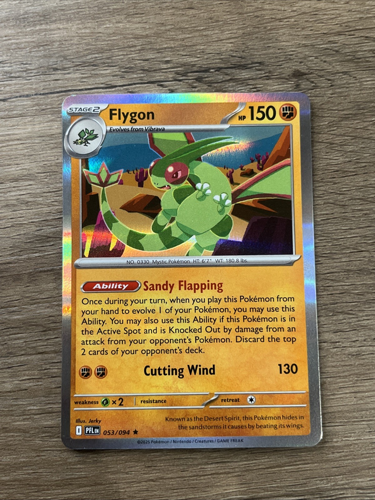 Flygon 053/094 Me02: Phantasmal Flames Holo