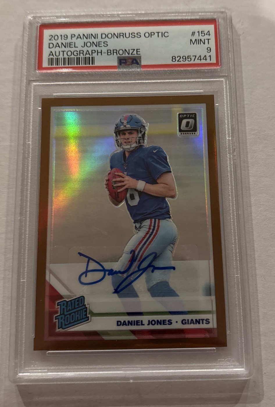 2019 Donruss Optic #154 Daniel Jones - (RC) Rated Rookie Bronze Auto Prizm PSA 9