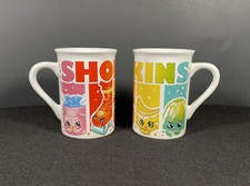 Tazas Shopkins Characters 2017 Frankford Candy 2 tazas de café paneles arco iris