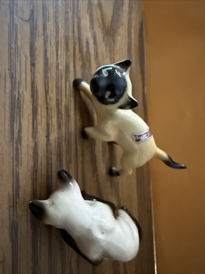 pair of cat figurines