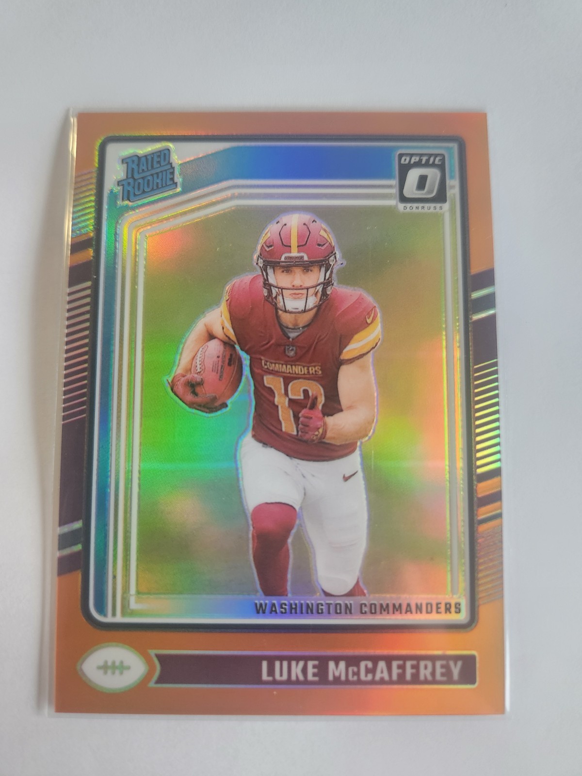 2024 Panini Donruss Optic - Rated Rookie Luke McCaffrey #268 Orange Prizm /249