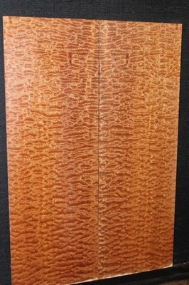Pomelle figured sapele electric guitar bookmatched drop top.