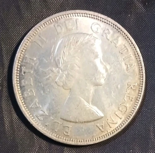 $1 DOLLAR CANADIAN SILVER COIN OF QUEEN ELIZABETH II DEI GRATIA REGINA 1864-1964