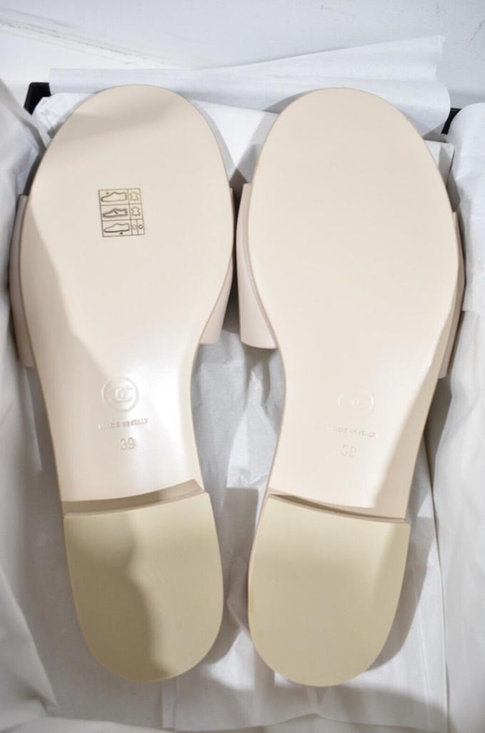 Chanel 23P Ivory White Leather CC Logo Letter Mules Slide