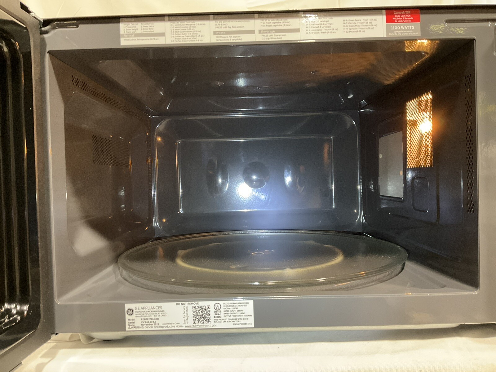 GE PEB7227DLBB Profile 2.2cu ft 1100W Sensor Cooking Countertop