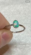  181B- .50ct Genuine Ethiopian Welo Opal set in a Size 7 Sterling Silver Ring